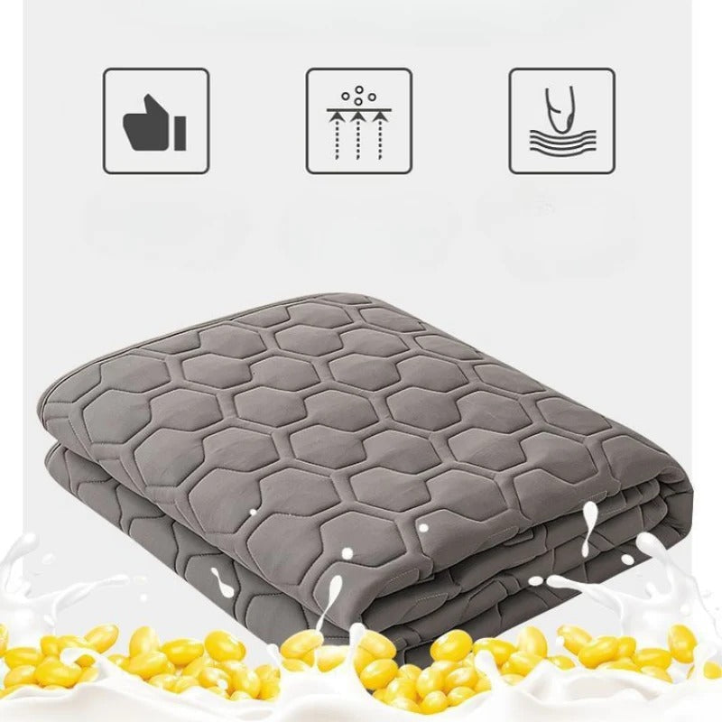 Belro cooling mattress pad on a bed, featuring breathable fabric and cooling technology for comfortable sleep.