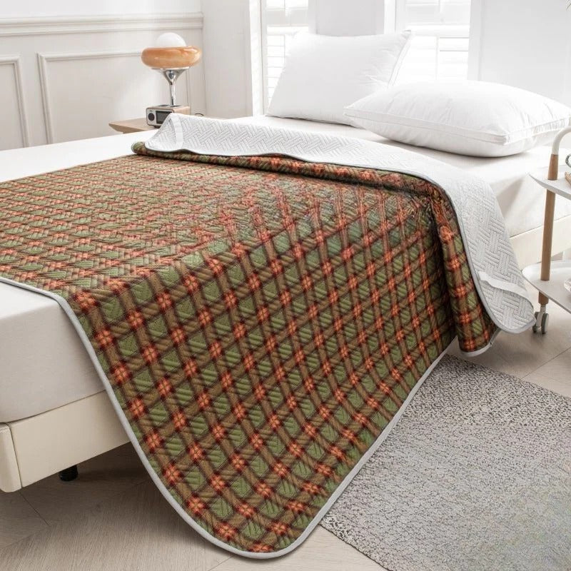 Belro cooling mattress pad on a bed, showing its breathable fabric and plush surface for comfortable sleep.