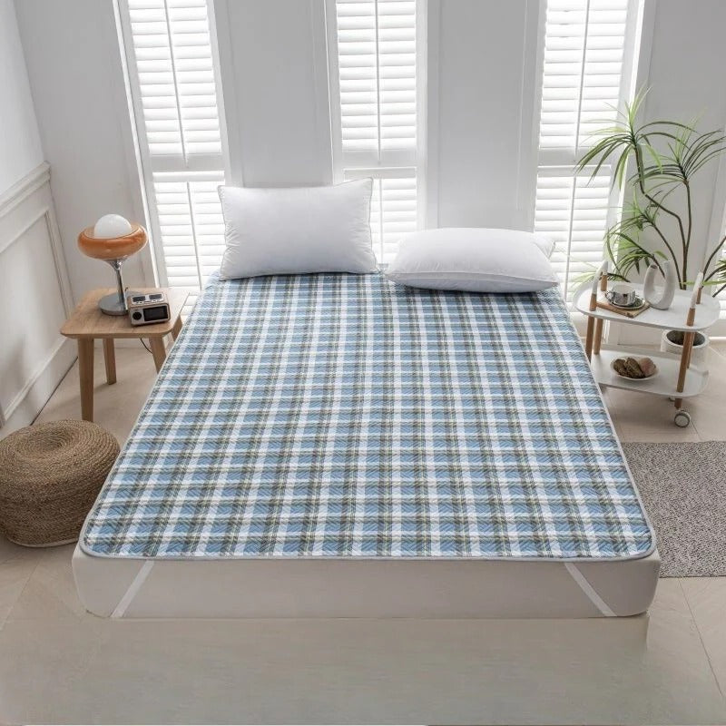 Belro cooling mattress pad on a bed, featuring a soft, breathable fabric designed to enhance sleep comfort and temperature regulation.