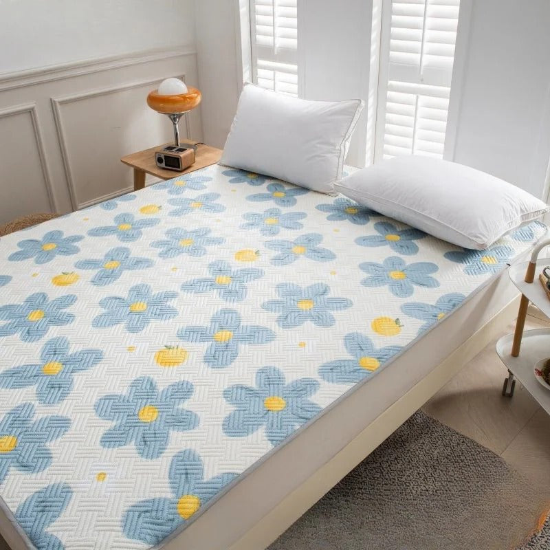 Belro cooling mattress pad shown on bed, designed to enhance sleep comfort with cooling features for a restful night.