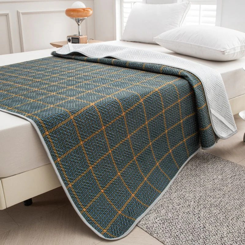 Belro cooling mattress pad on a bed, made for enhancing sleep comfort with breathable, cooling fabric in a home bedding setting.