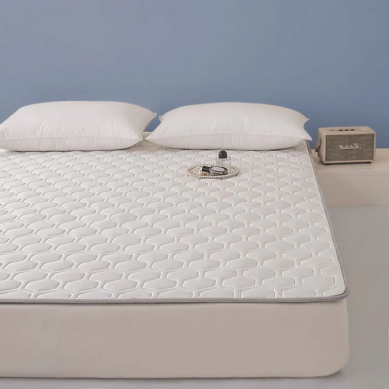 Cooling mattress pad by Belro, soft and breathable bedding topper designed to enhance sleep comfort and temperature regulation.