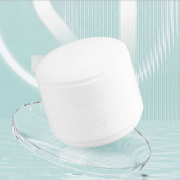 Belro Compact Ultrasonic Jewelry Cleaning Device shown with accessories, highlighting its small size and cleaning features.