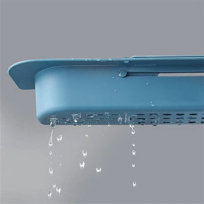 Belro expandable sink organizer for kitchen, featuring multiple compartments for utensils and sponges, made of durable plastic.