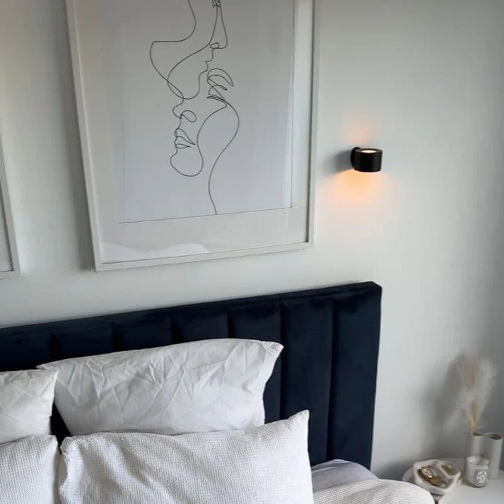 Belro LED rechargeable wall light mounted outdoors, providing bright illumination for home and garden spaces.