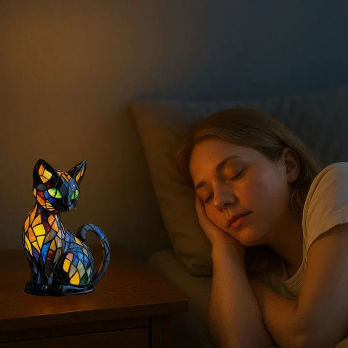 Belro stained glass cat table lamp with colorful stained glass shade and decorative feline design on a nightstand.