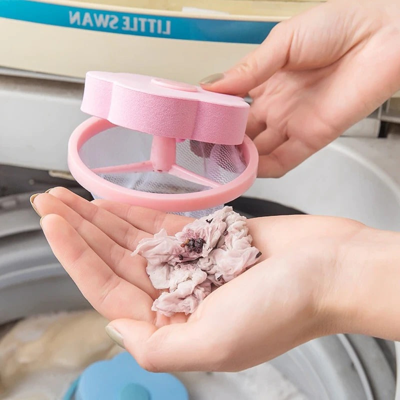 Belro laundry lint and fur remover in use, showing its handheld design for removing pet hair and lint from clothing and upholstery.