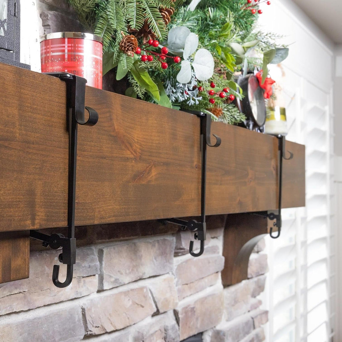 Belro adjustable fireplace stocking and garland hanger set, made of durable material, designed to hang holiday decorations comfortably.