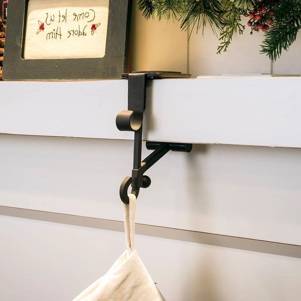 Belro Adjustable Fireplace Stocking and Garland Hanger Set hanging on fireplace mantel with stockings and greenery.