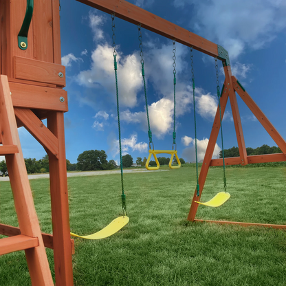 Casavibeo Atlantis wooden swing set with slide and play deck, featuring sturdy construction and colorful accessories for kids' outdoor play