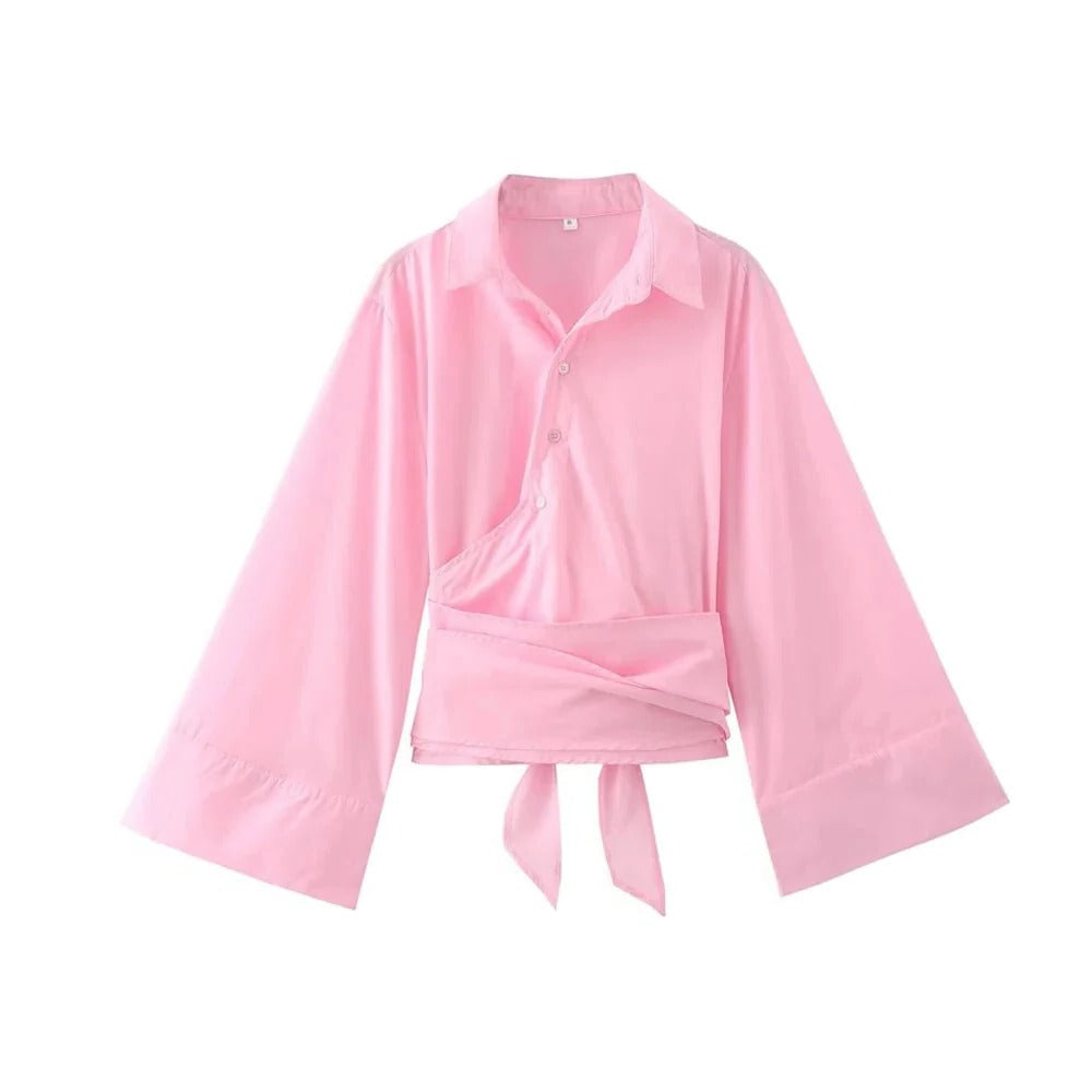 Men's Belro blouse with wide bow belt, stylish clothing featuring a relaxed fit and a prominent bow detail at the waist.