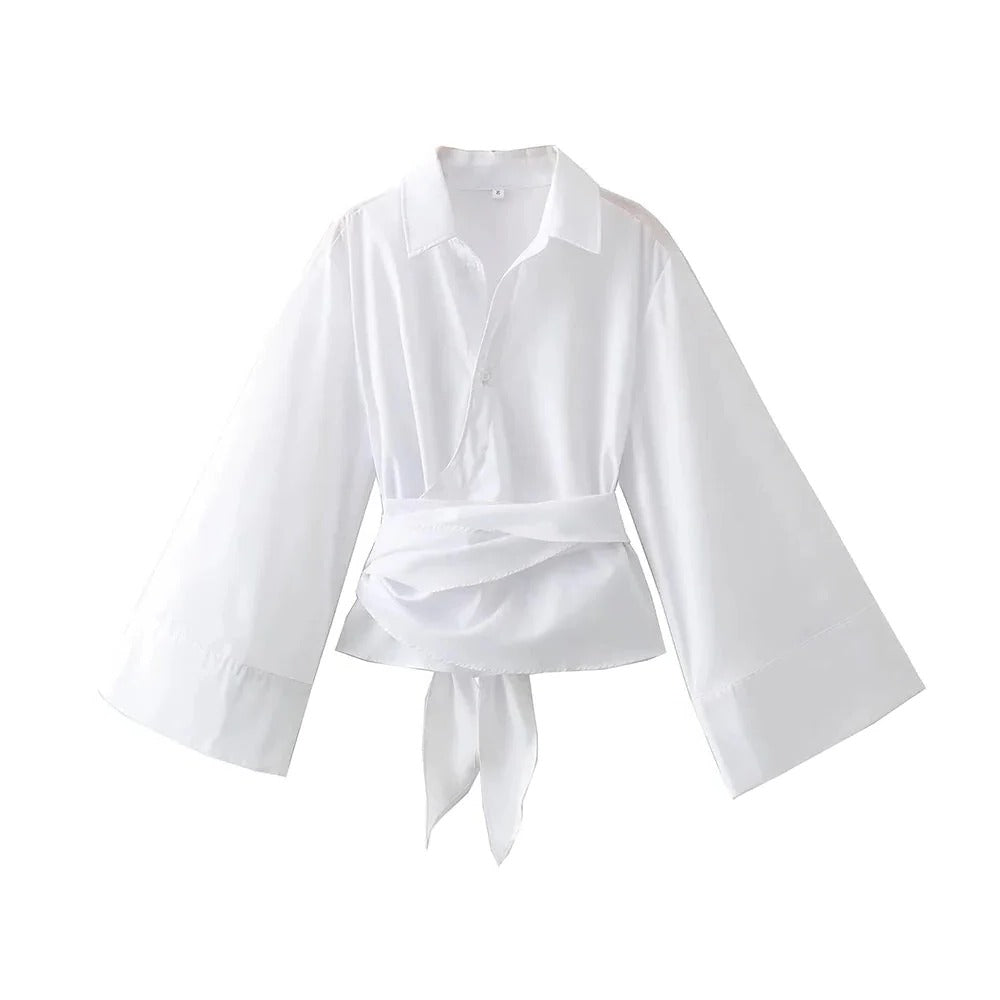 Men's blouse by Belro with a wide bow belt, featuring a stylish and modern design in a close-up view.