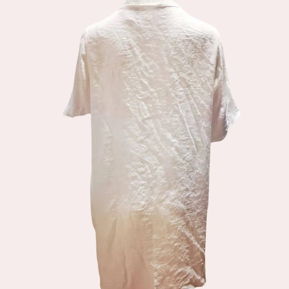Light summer dress for women by Belro, showcasing a sleeveless design with a flowy fabric and floral print.
