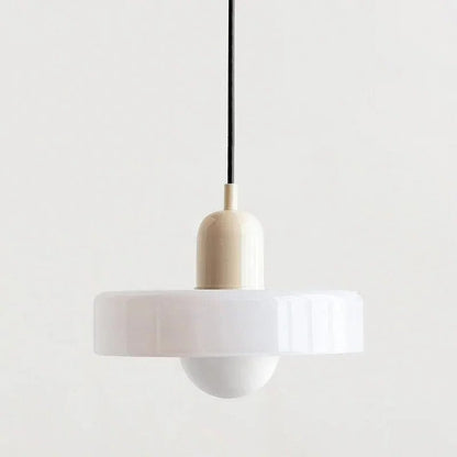Belro hanging pendant light with a sleek modern design, featuring a metal fixture and illuminated glass shade.