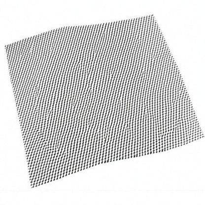Belro non-stick BBQ grill mesh mat laid on a grill, perfect for grilling vegetables and meats without sticking or mess.