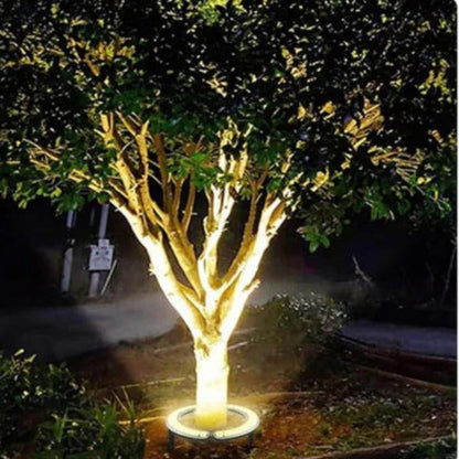 Belro LED Tree Spotlight illuminating a garden tree with bright, energy-efficient outdoor lighting in a home garden setting.