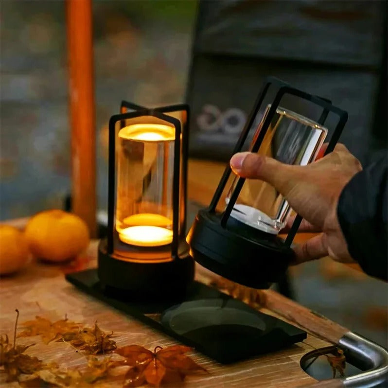 Modern Belro cordless Nordic table lamp with sleek design, illuminated softly on a bedside table in a cozy room setting.