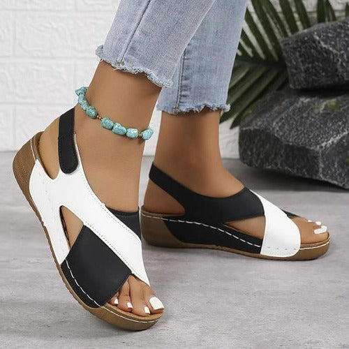 Belro ergonomic slide sandals with cushioned footbed and minimalist design for comfortable everyday wear.