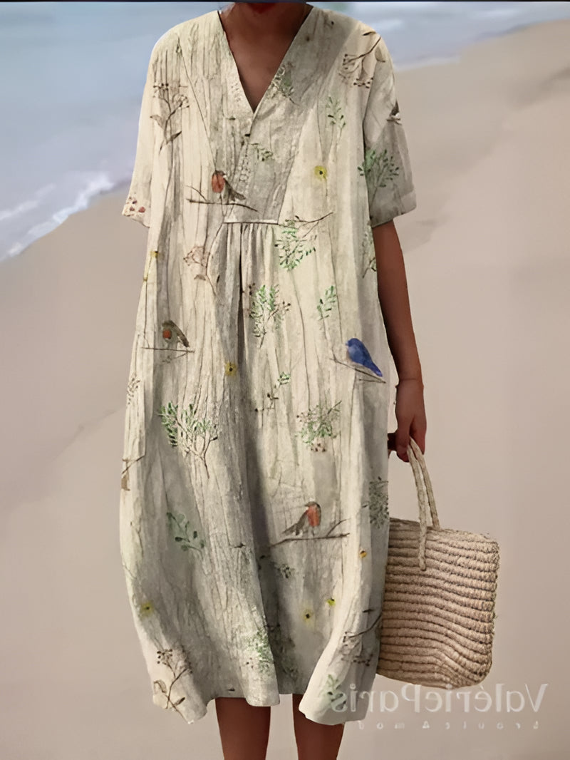 Belro summer dress featuring lightweight fabric, floral pattern, and sleeveless design perfect for warm weather.