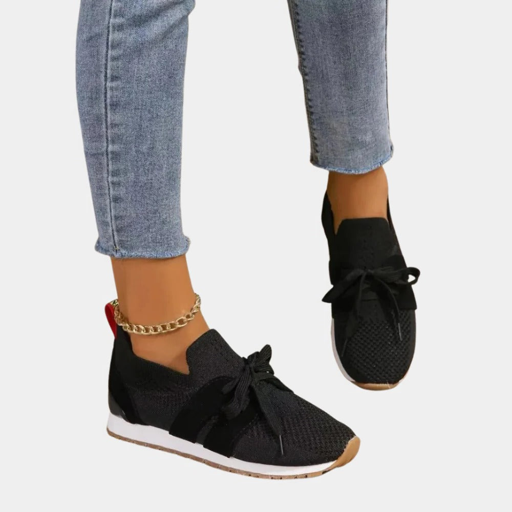 Belro women's stylish sneakers with white and pastel accents, showcasing breathable mesh and comfortable athletic design.