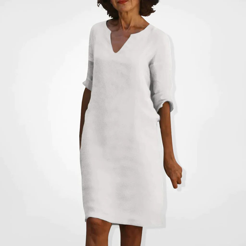 Belro summer dress with V-neck, lightweight fabric, and sleeveless design ideal for warm weather and casual outings.