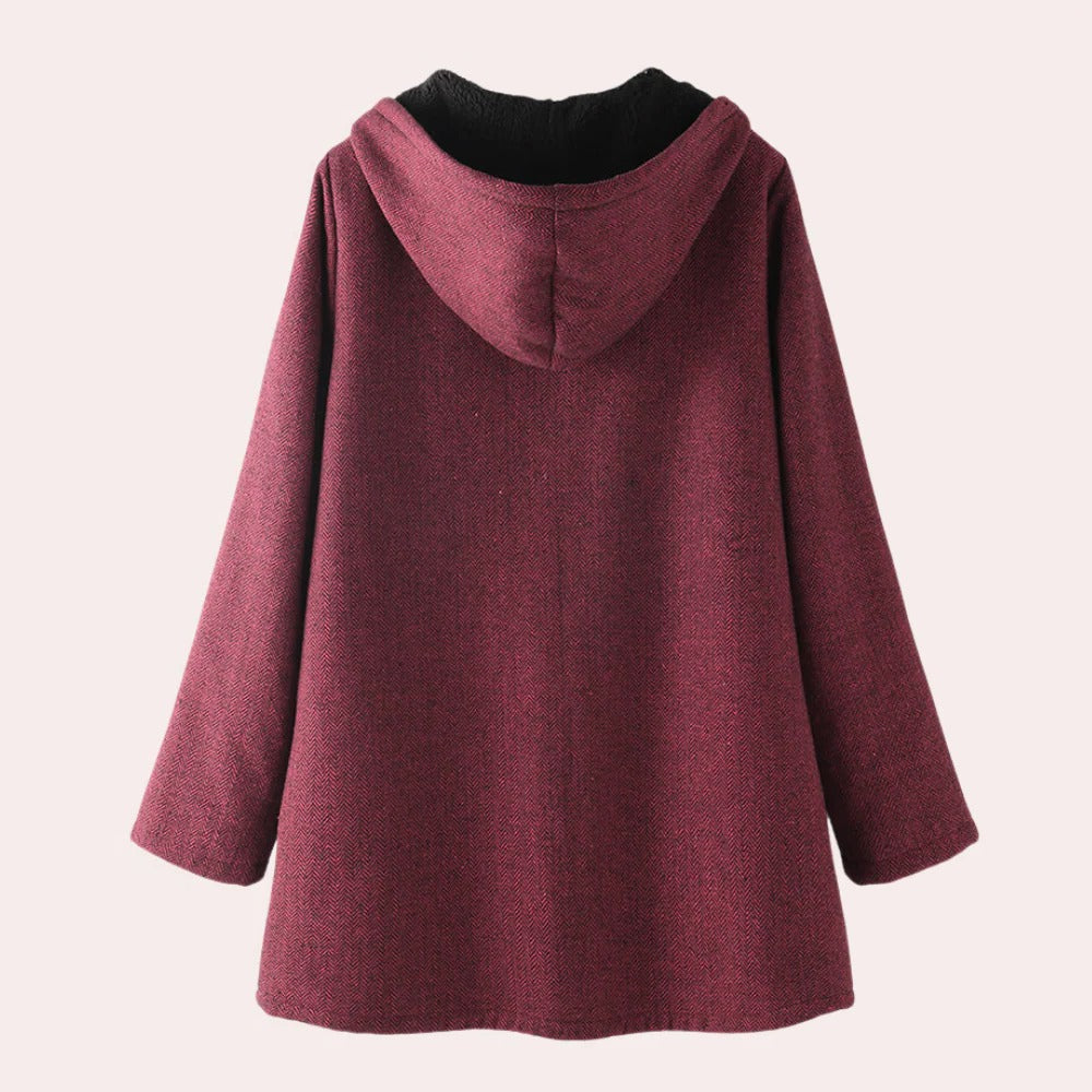 Women's Belro casual warm hooded jacket displayed on a hanger, featuring a cozy design and neutral color for cold weather.