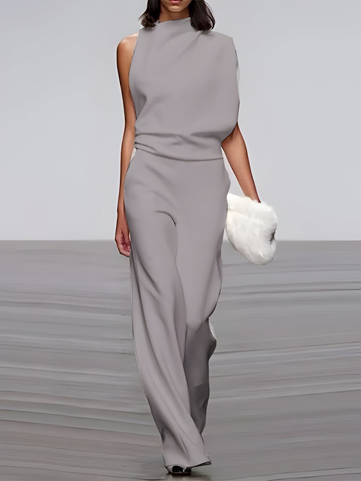 Women's sleeveless round-neck jumpsuit with flared legs by Belro, featuring a stylish and comfortable pants design.