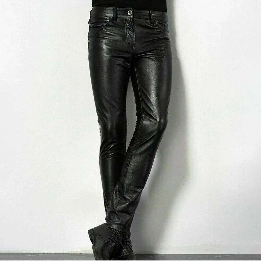 Men's leather jeans by Belro featuring a close-up view of the dark leather fabric and stitching details.