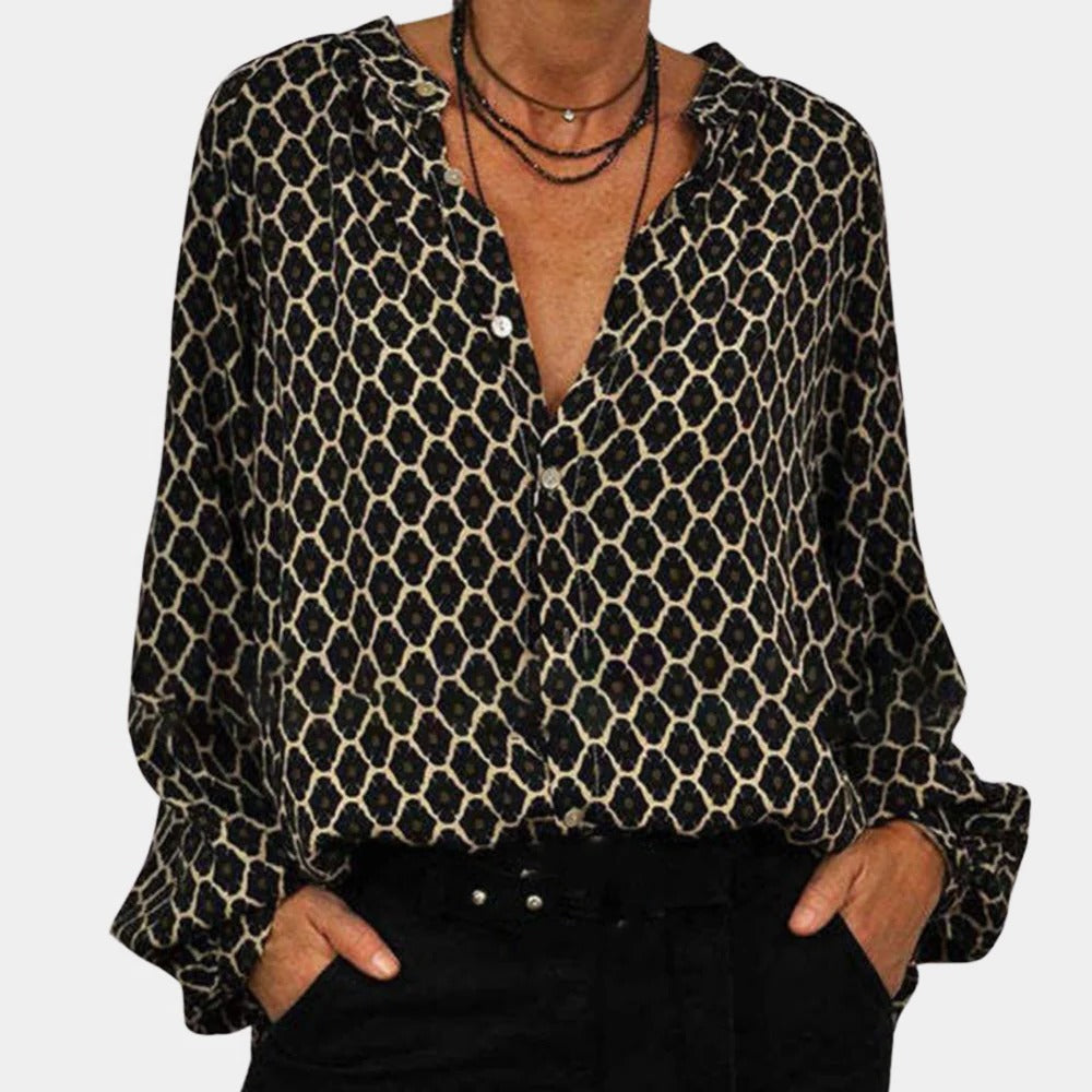 Comfortable Belro ladies blouse with long sleeves and a relaxed fit, featuring a soft, lightweight fabric in a versatile design.