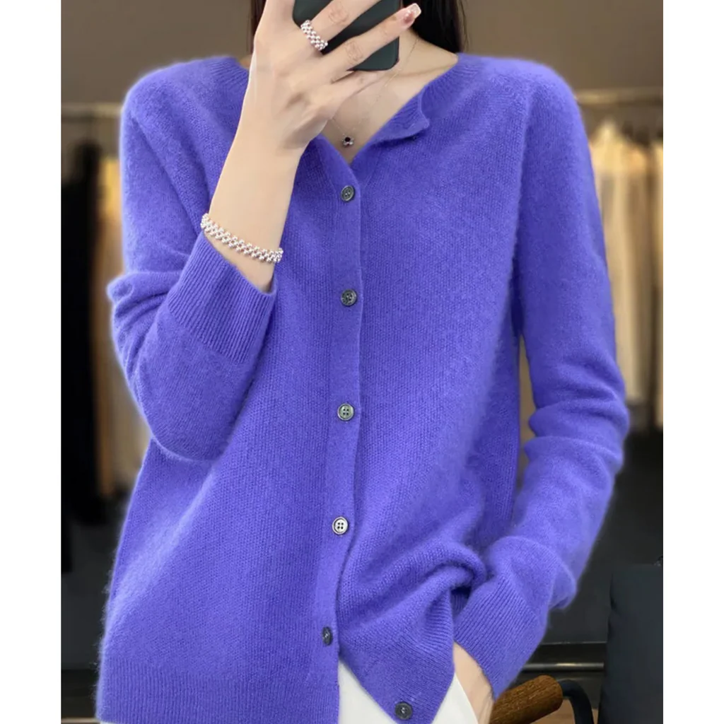 Women's Belro round neck cardigan sweater, featuring a cozy knit design, displayed on a model with a neutral background.