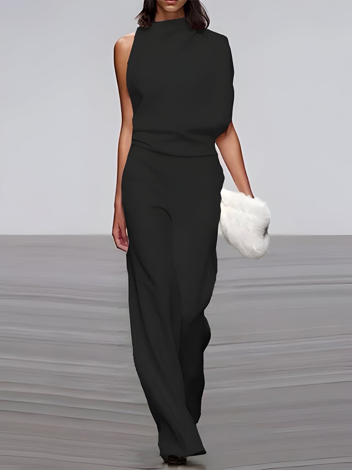 Women's sleeveless round-neck jumpsuit with flared legs by Belro, featuring a stylish and comfortable design.