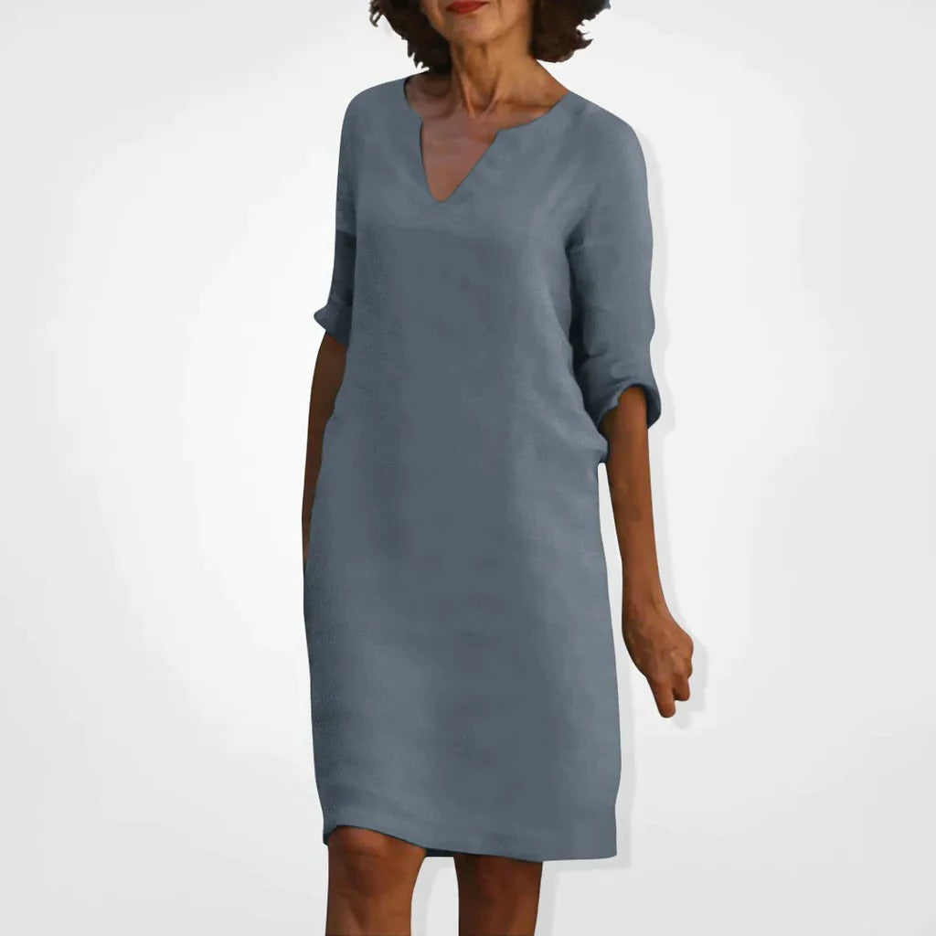 Belro summer dress with V-neck, lightweight fabric, sleeveless design, and stylish fit perfect for warm weather.