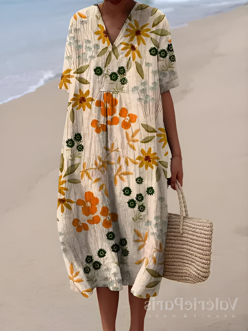 Elegant summer dress by Belro featuring lightweight fabric, floral pattern, and a flowing silhouette perfect for warm weather.