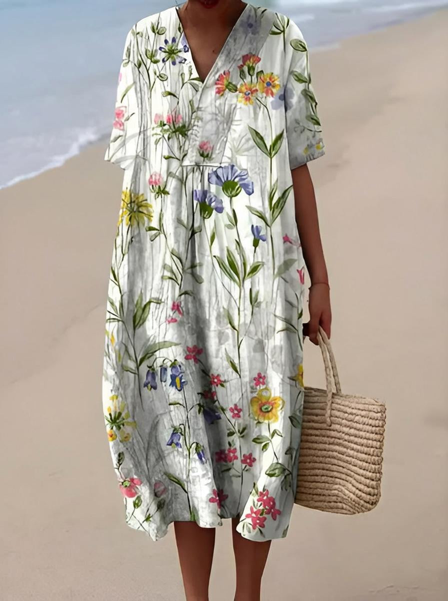 Belro summer dress featuring a floral pattern, lightweight fabric, sleeveless design, perfect for warm weather and casual outings.