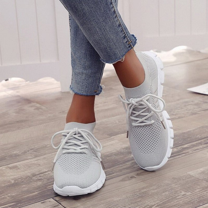 Belro orthopedic sneakers in gray with supportive soles and breathable mesh upper, designed for comfort and foot health.