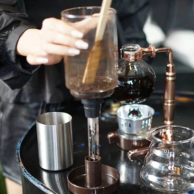 Belro Japanese syphon coffee maker with glass vessel and metal frame, perfect for brewing traditional siphon-style coffee.