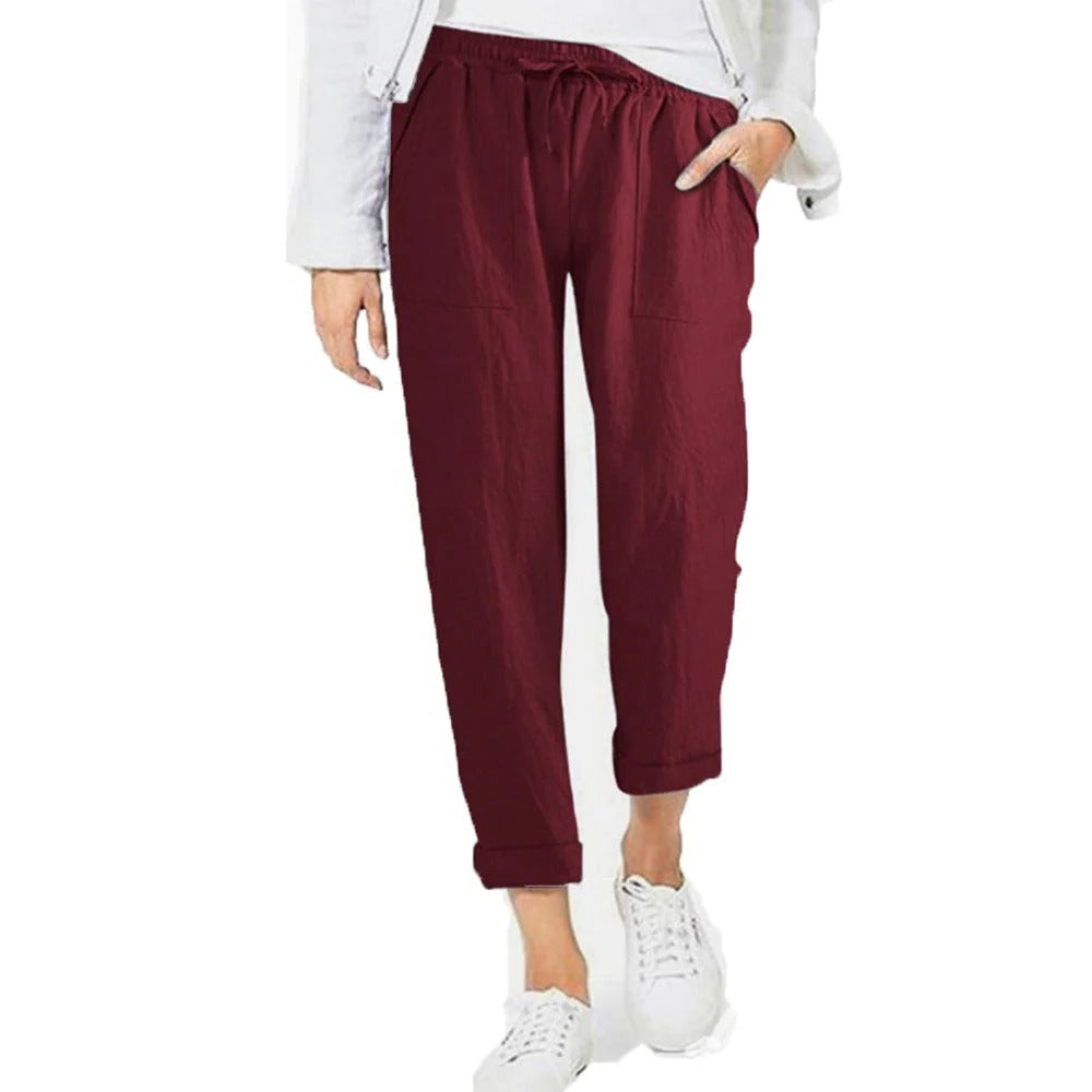 Belro summer trousers in lightweight fabric, shown in a relaxed fit with a neutral color and casual style.