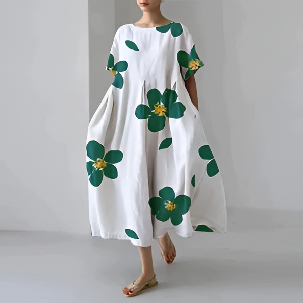 Belro floral print casual and elegant dress with a flowing silhouette, showcasing vibrant flora patterns on lightweight fabric.