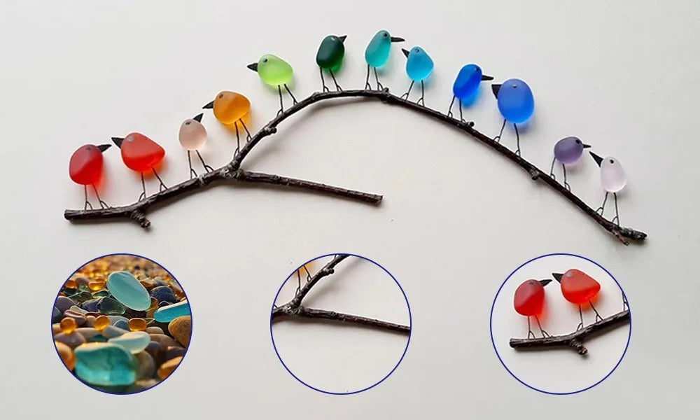 Sea glass birds decor by Belro, coastal love notes for home and garden, featuring colorful glass bird ornaments on a natural setting.