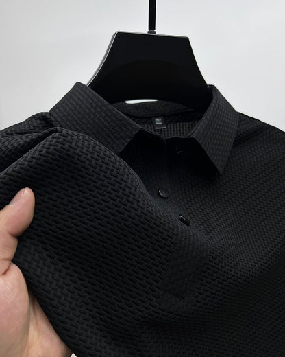 Men's Belro mesh polo shirt in navy, featuring a classic collar and short sleeves, made of breathable fabric for casual wear.
