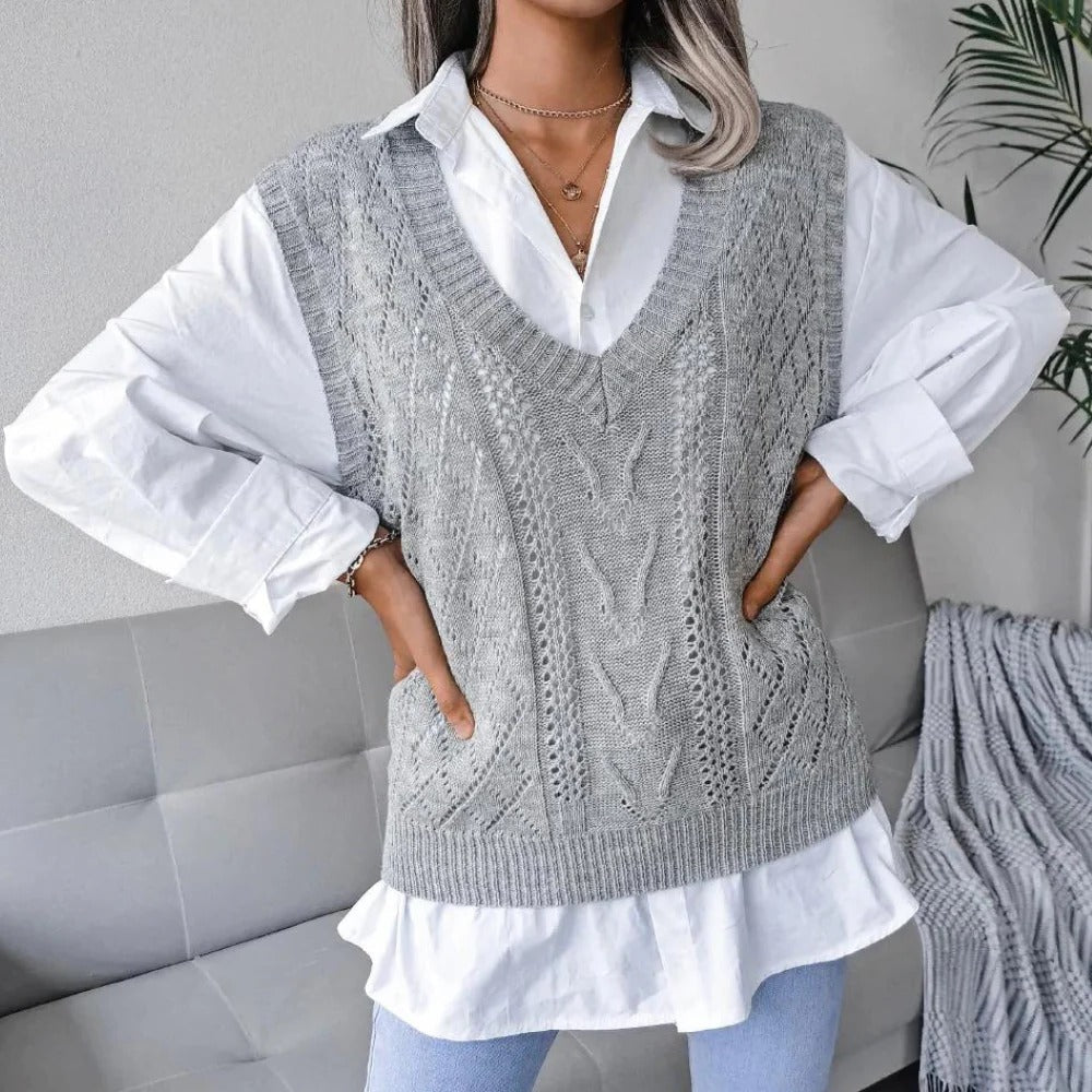Women’s V-neck knitted cardigan by Belro, featuring a cozy, stylish design with a V-shaped neckline and textured knit fabric.