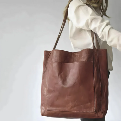 Belro women's leather bag with sleek design, featuring a smooth leather surface and stylish handle for versatile accessories.