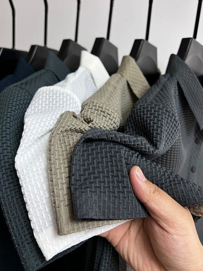 Men's Belro mesh polo shirt in lightweight, breathable fabric, shown in a classic polo style with short sleeves.