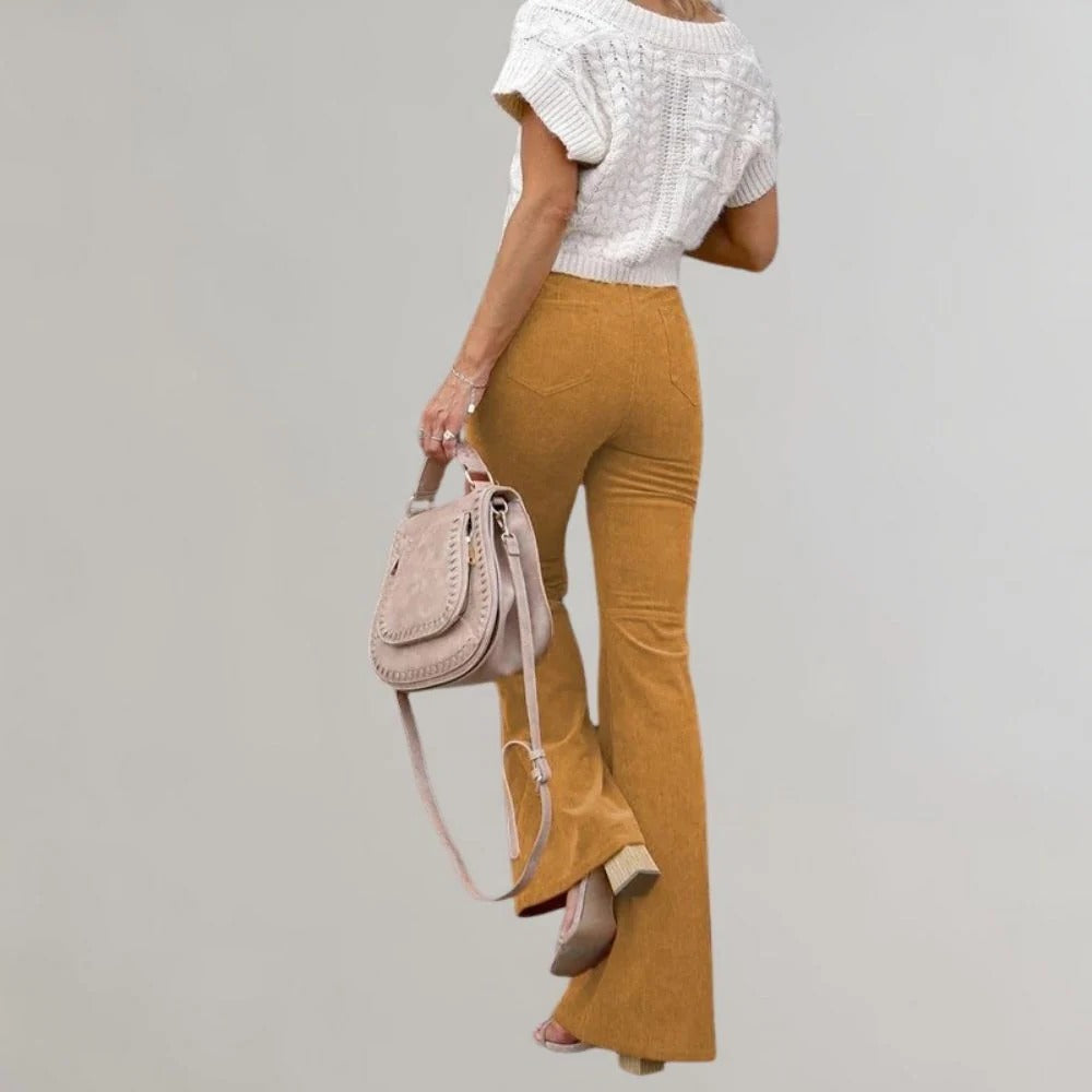 Belro trendy corduroy flared trousers in a rich color, showcasing the high-waisted fit and wide-leg style.
