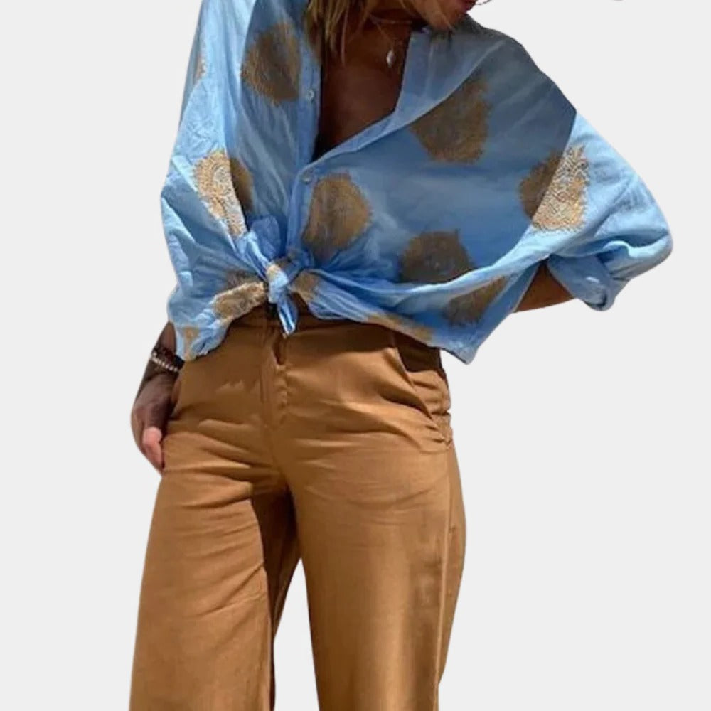 Belro women's blouse, stylish top with long sleeves and a classic fit, ideal for casual or office wear.