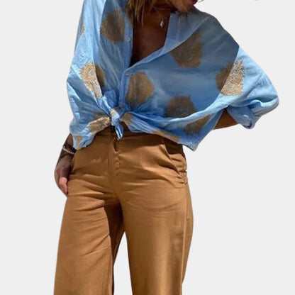 Belro women's blouse, stylish top with long sleeves and a classic fit, ideal for casual or office wear.