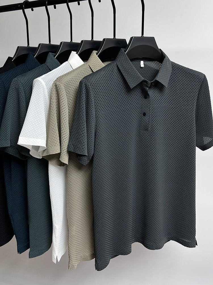 Men's Belro mesh polo shirt in lightweight, breathable fabric, shown in a close-up view of the collar and fabric texture.
