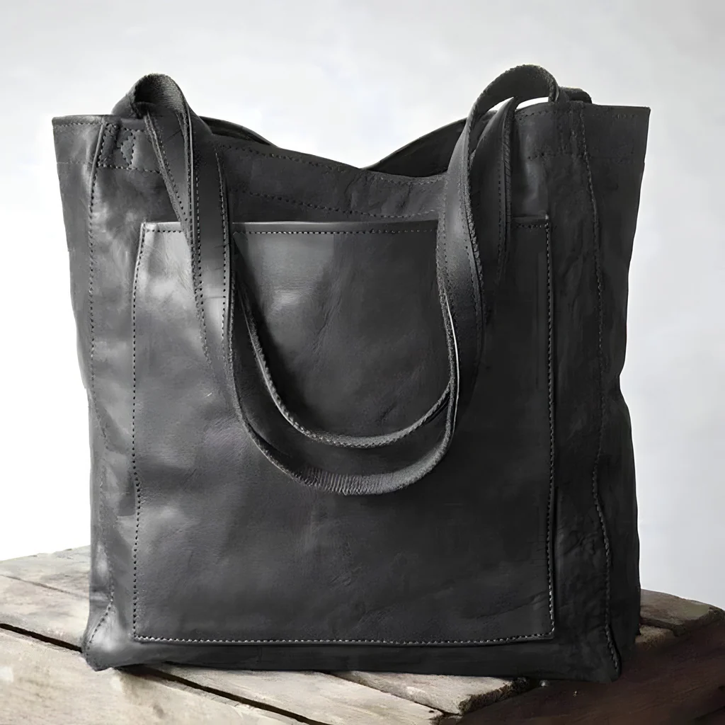 Belro women's leather bag showcasing a stylish, compact accessory with smooth leather finish and versatile design.