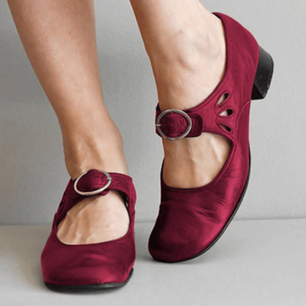 Belro leather sandals featuring open toes and ankle straps, displayed on a neutral background.