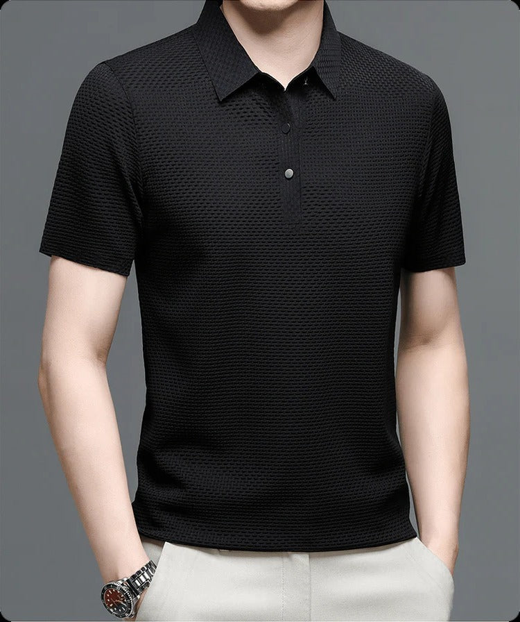 Men's Belro mesh polo shirt in navy with short sleeves and collar, displayed on a hanger against a plain background.
